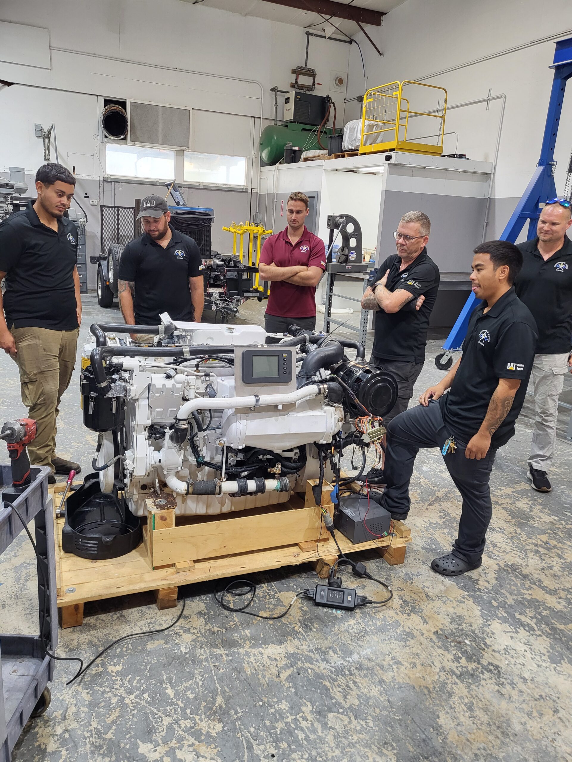Florida-based diesel technicians participate in CAT C7 engine training at Performance Power Systems
